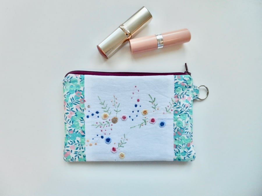 Make up bag in reclaimed embroidered cloth with Liberty trim and denim