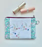 Make up bag in reclaimed embroidered cloth with Liberty trim and denim