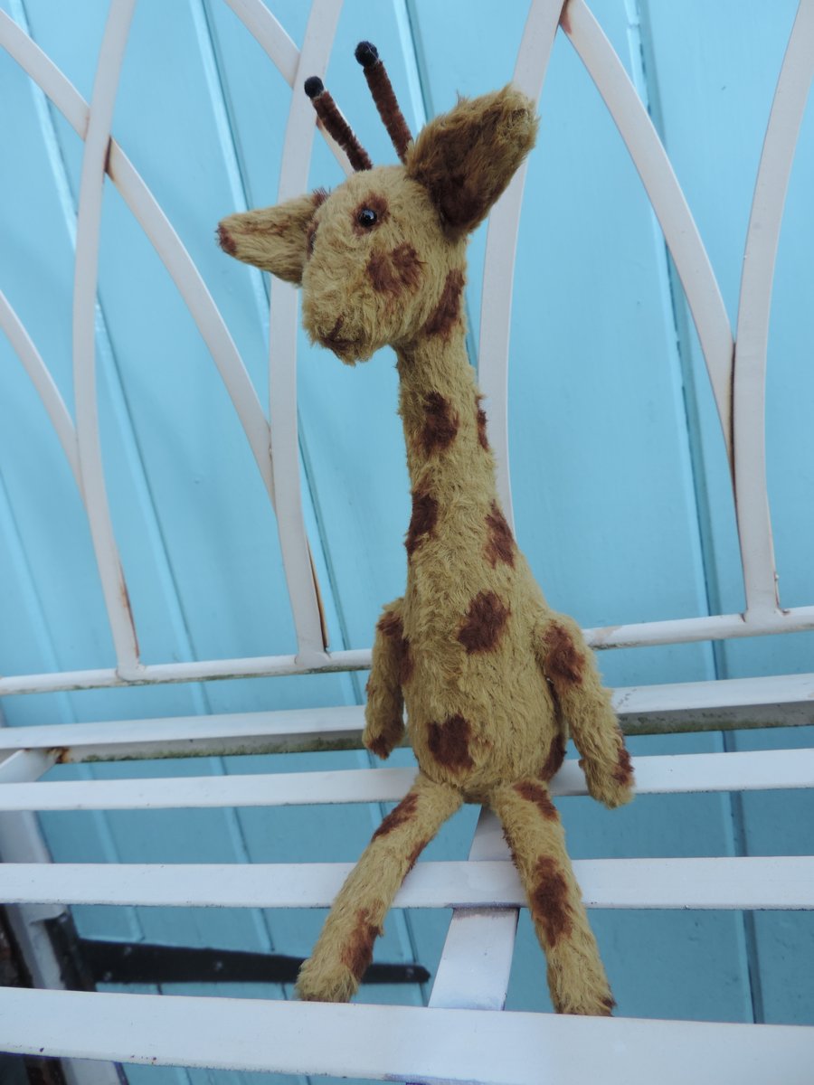 8" Handmade Giraffe.