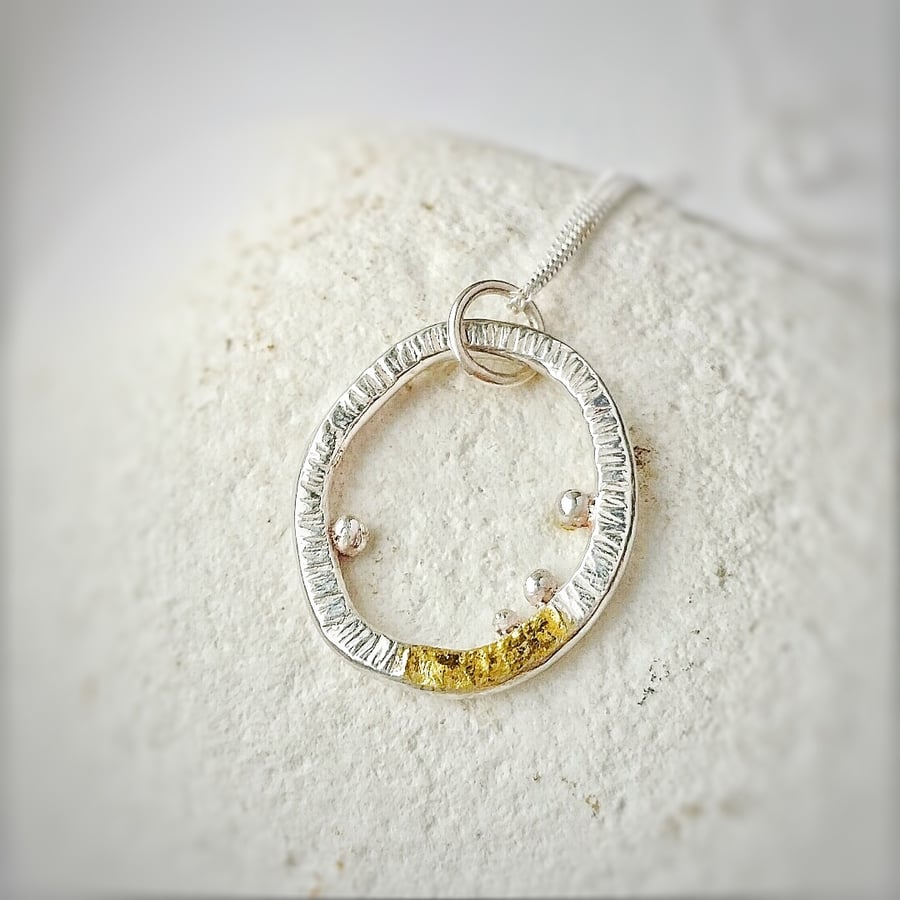 Lichen inspired quirky textured silver necklace with gold detail