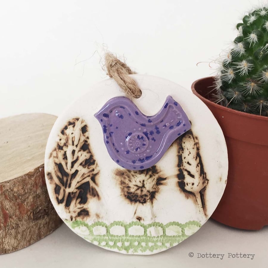 Pottery decoration with natural flower design and pottery bird