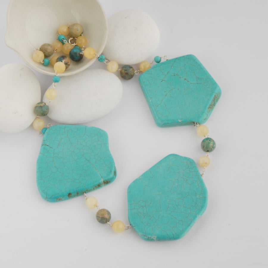 Turquoise magnesite and yellow ambrolite beaded silver statement necklace