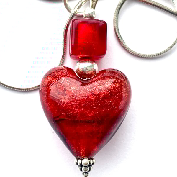 Murano glass red heart pendant with sterling silver.