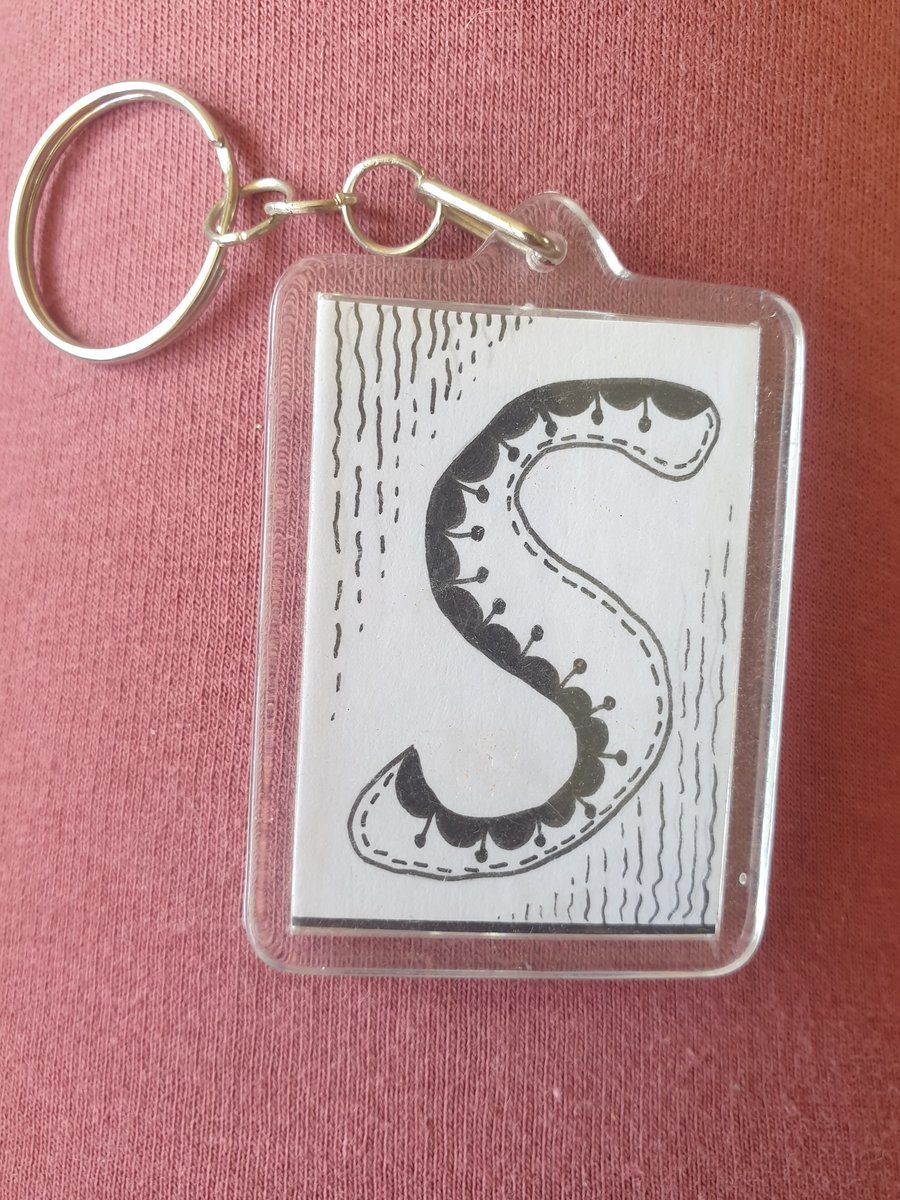 Hand drawn initial "S" keyring.