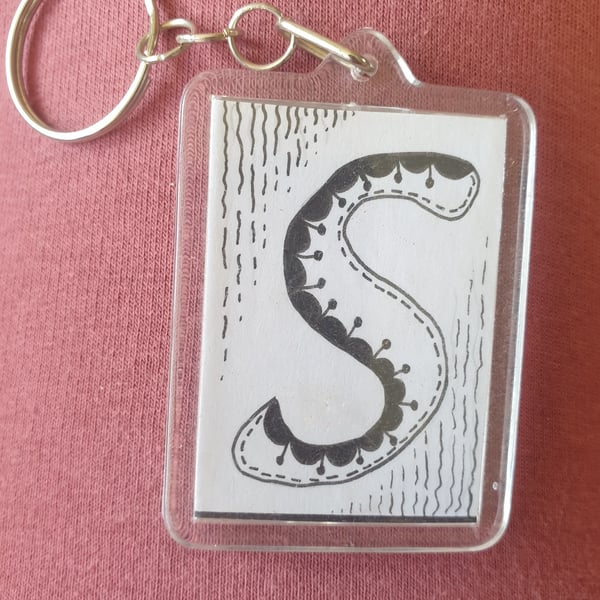 Hand drawn initial "S" keyring.