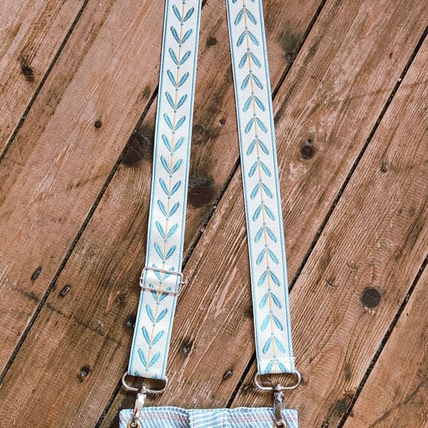 DENIM STRIPE MOBILE PHONE BAG WITH BUTTERFLY FLORAL POCKET, AND STRAP