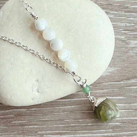 Silver pendant with peridot  raw cystal charm.
