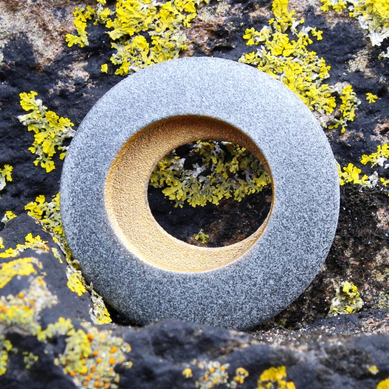 Round pebble brooch with golden hollow centre, nature inspired 