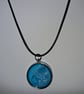Handmade blue pendant on black waxed cord