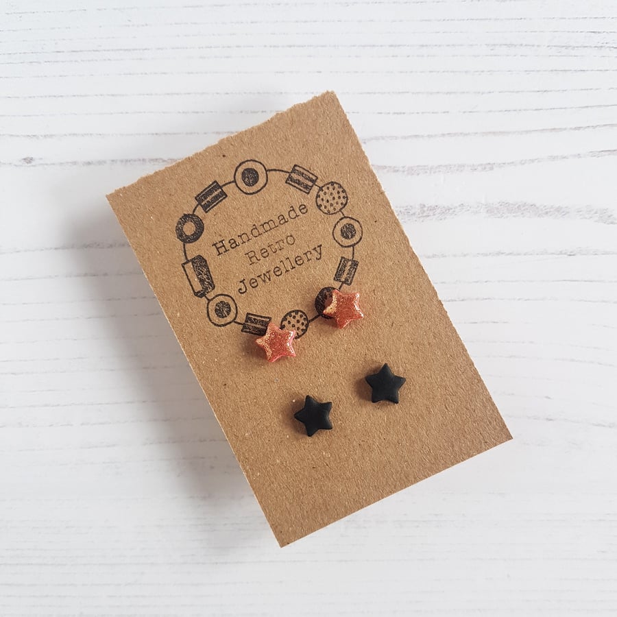 Two pack micro rose gold glitter and matt black star stud earrings