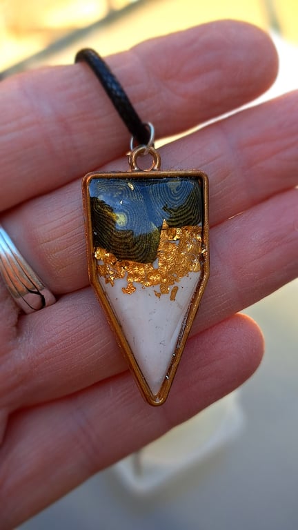 2 designs Rope necklace with a polymer clay filled bezel. Gold leaf, black white