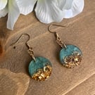 Green and gold resin dangle earrings