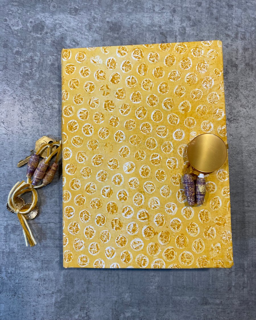 Handmade Coptic stitch notebook, sketchbook, yellow spot design. Artists journal