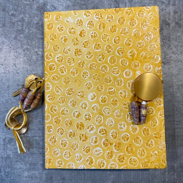 Handmade Coptic stitch notebook, sketchbook, yellow spot design. Artists journal