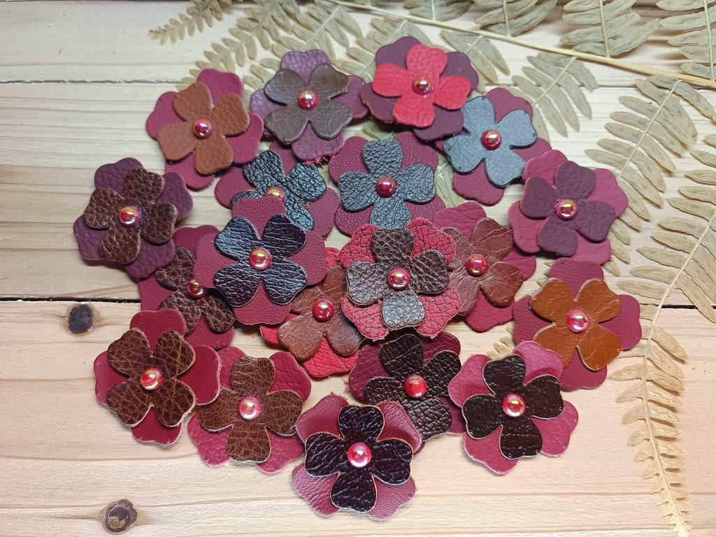 Scrapbooking, sewing real leather flowers 