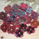 Scrapbooking, sewing real leather flowers 