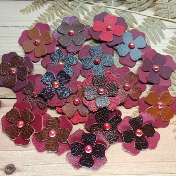 Scrapbooking, sewing real leather flowers 