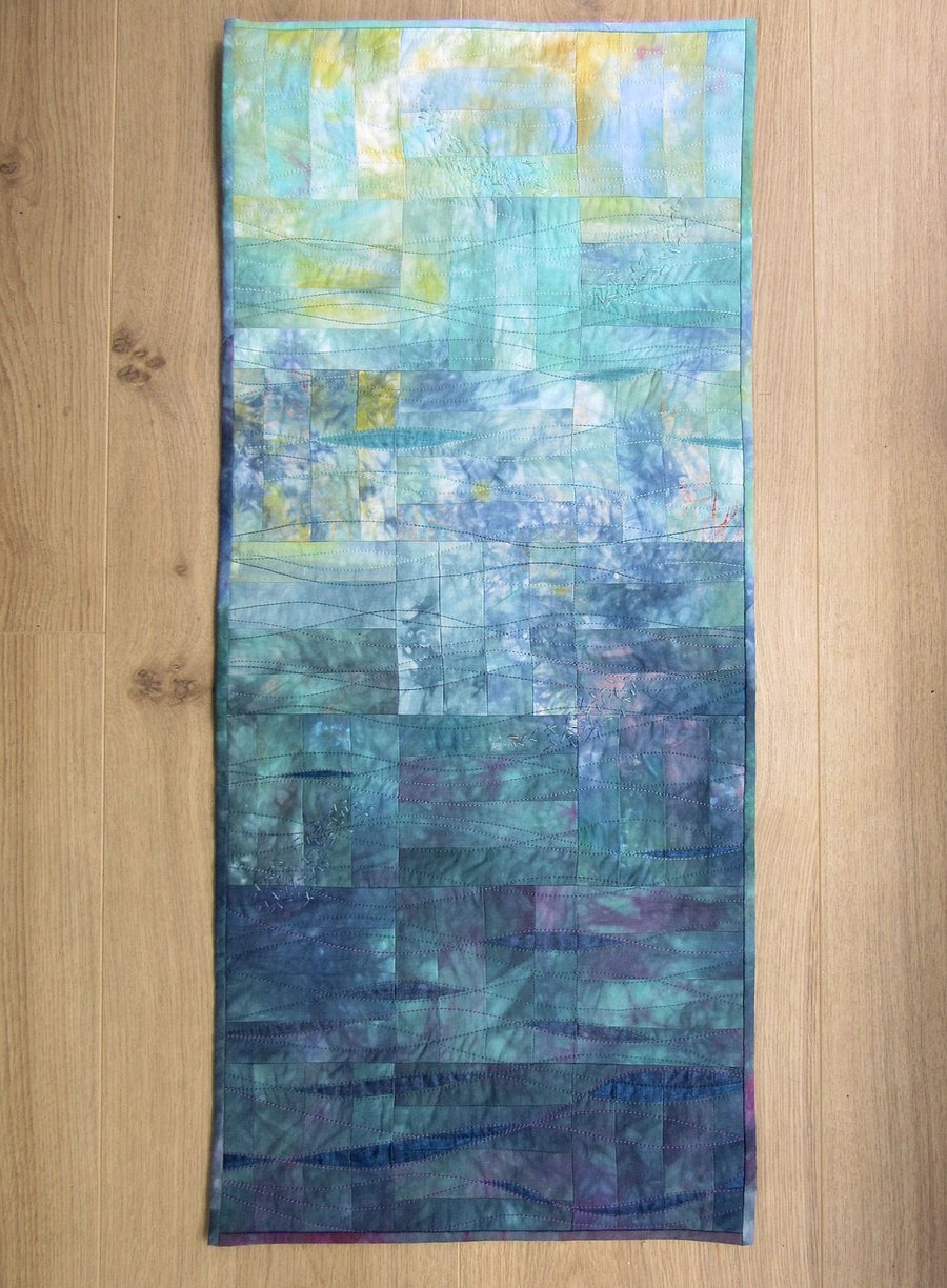 SEA VIEW ABSTRACT QUILTED WALL HANGING. A picture of the ocean, sea and sky