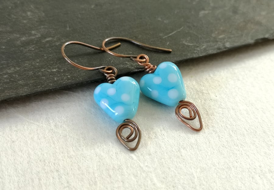 Copper earrings with turquoise polka dot heart bead