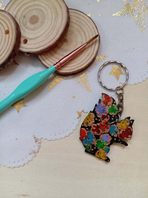 Wooden squirrel shaped colourful patterned keyring 
