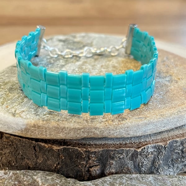 Colourful bright turquoise blue beaded cuff bracelet