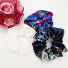 Set of 3 large scrunchies,  white satin,  navy velour and blue petal.  