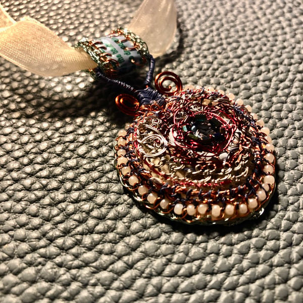 Recycled beaded heart pendant on ribbon