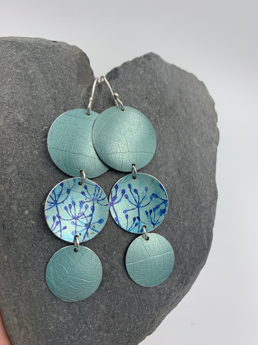 3 circle aluminium dangly earrings in pale teal with cow parsley print