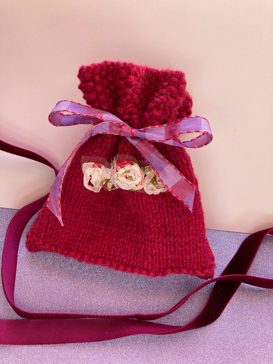 Hand knitted gift bag in raspberry pure new wool