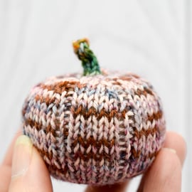Hand knitted mini pumpkin pin cushion variegated pinks and brown