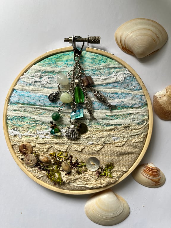Textile seascape with bead and charm details 