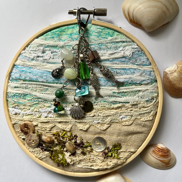 Textile seascape with bead and charm details 