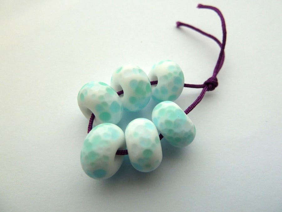 white and blue lampwork glass beads