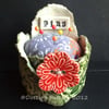 ceramic pincushion with flower button