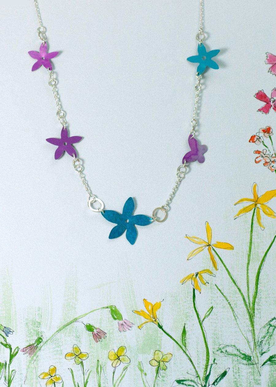 Wildflowers and tiny butterfly necklace.