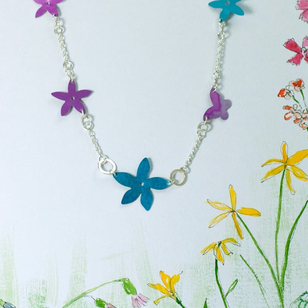 Wildflowers and tiny butterfly necklace.