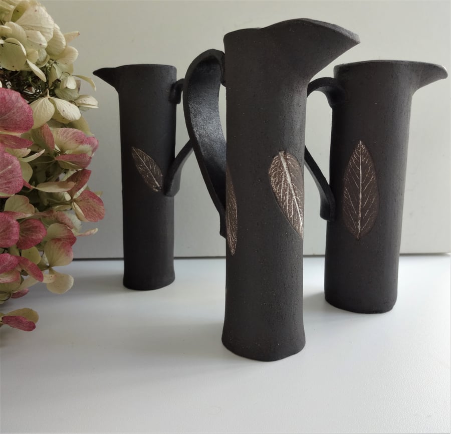 Suki - slim jug with sage leaf motif in black stoneware ceramic