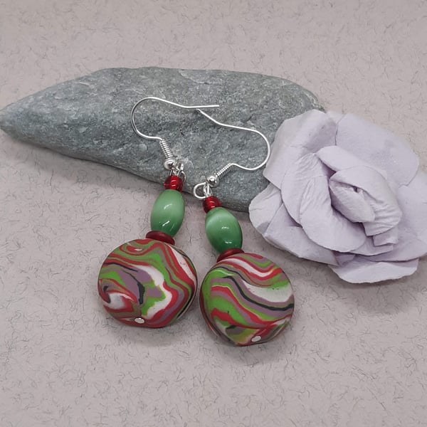 Multicoloured disc shaped polymer clay earrings