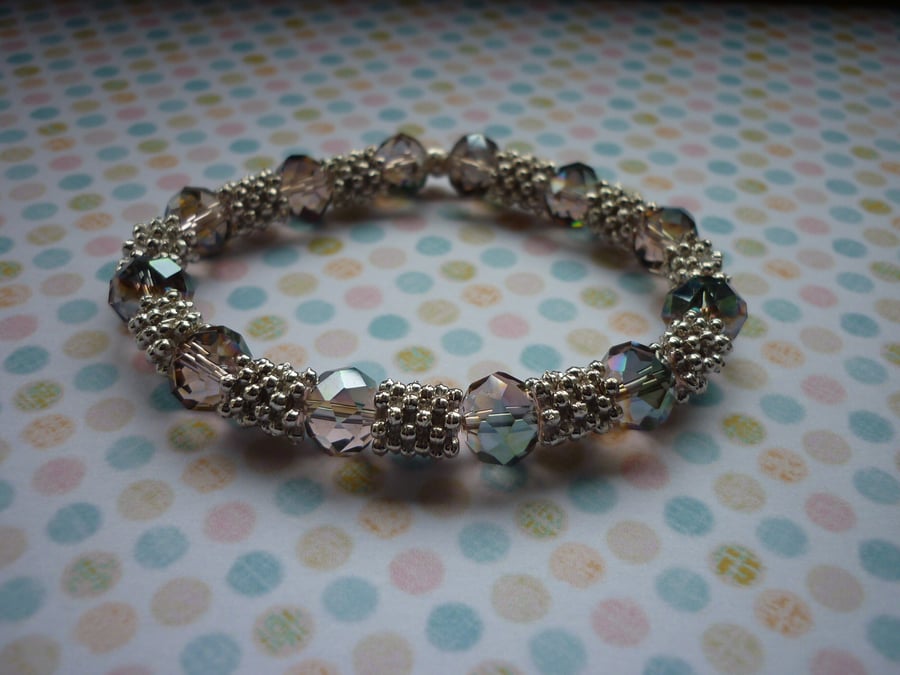 GREEN AB, ROSE AB AND SILVER BRACELET.