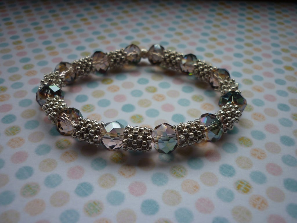 GREEN AB, ROSE AB AND SILVER BRACELET.