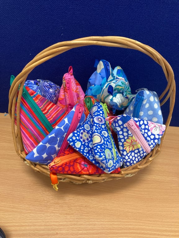 Pyramid purses for phone chargers