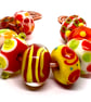 Handmade Lampwork Glass Beads – Fiery Orange, Red & Lime Green Set of 9