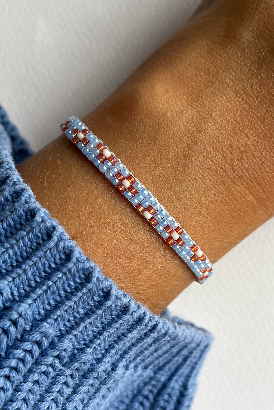 Soft Blue & Orange Floral Bracelet – Handwoven Stacking Jewellery