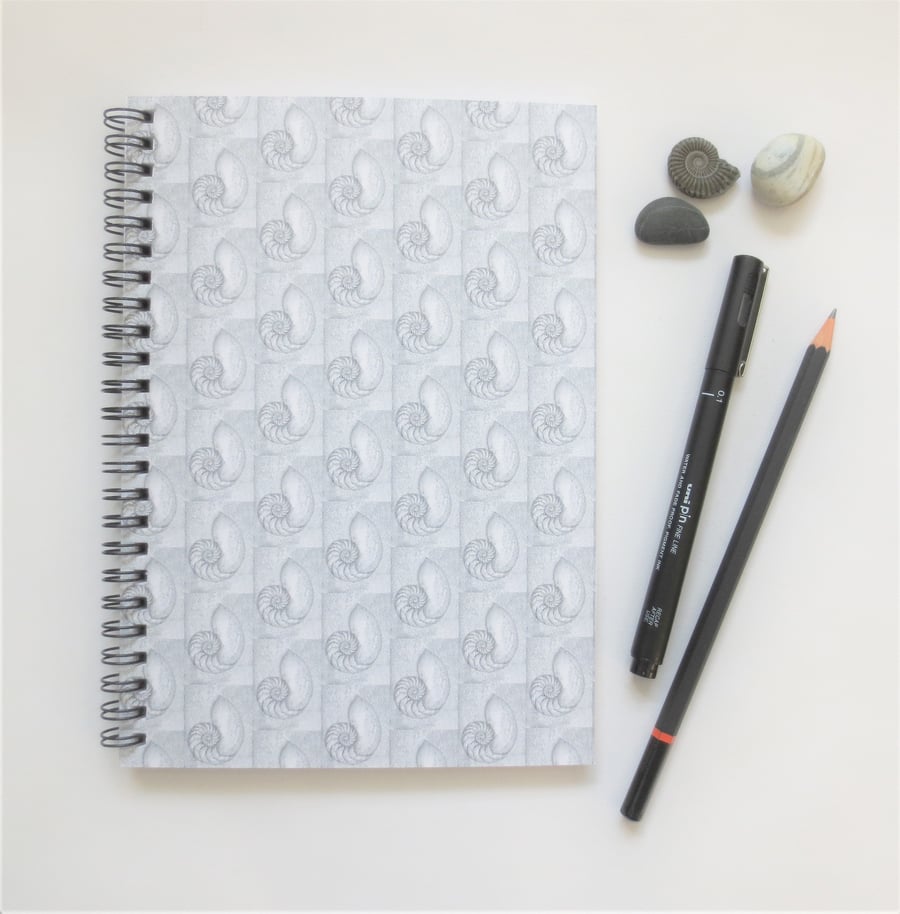 Seconds Sunday A5 lined spiral notebook cover design a chambered nautilus shell 