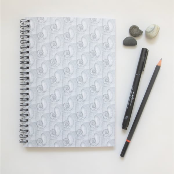 Seconds Sunday A5 lined spiral notebook cover design a chambered nautilus shell 
