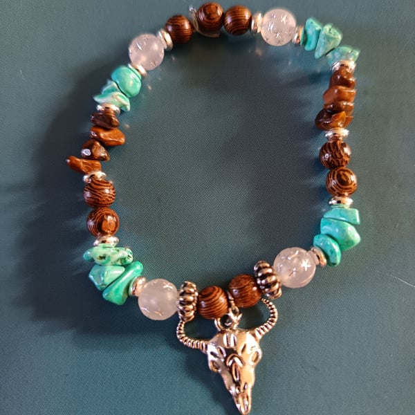 Elasticated silver goat skull charm bracelet with wooden beads and crystal chip 