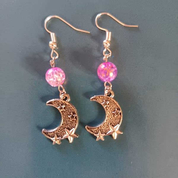 Silver cresecent moon dangle earrings with lilac bead detail
