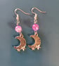Silver cresecent moon dangle earrings with lilac bead detail