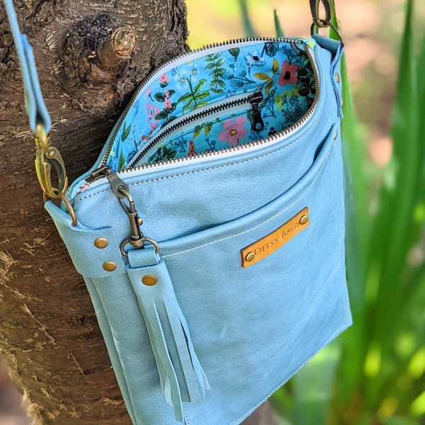 Shabby chic leather crossbody bag with pretty floral lining