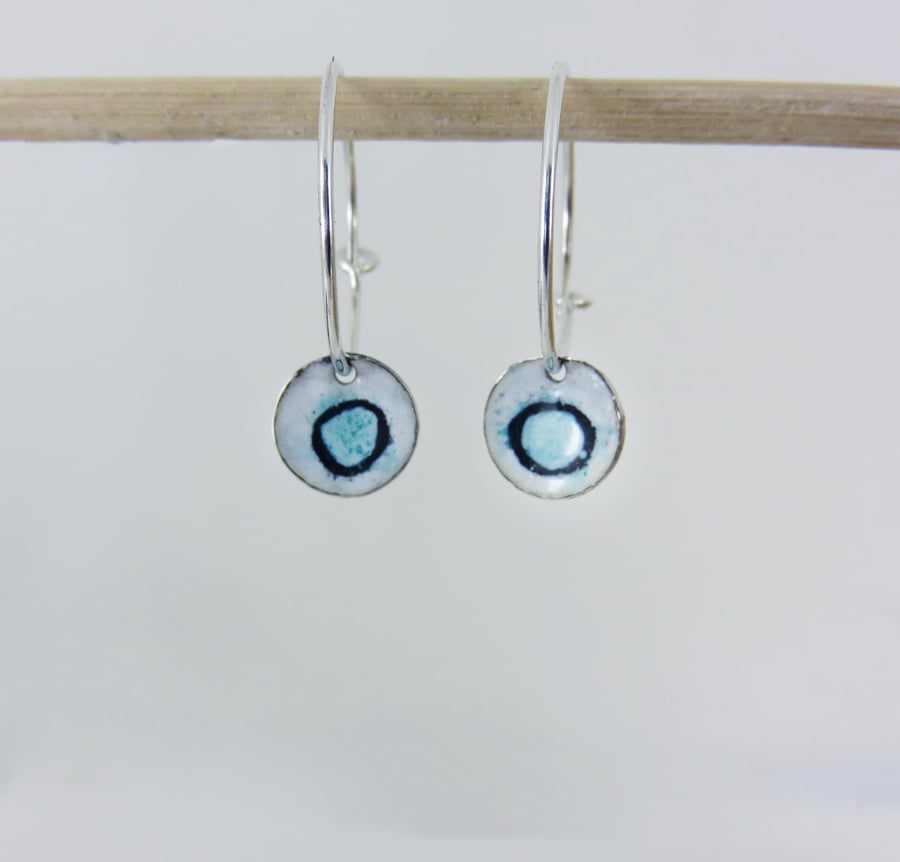 Silver Hoops with Hand Drawn Circle in Enamel on a Silver Disc.